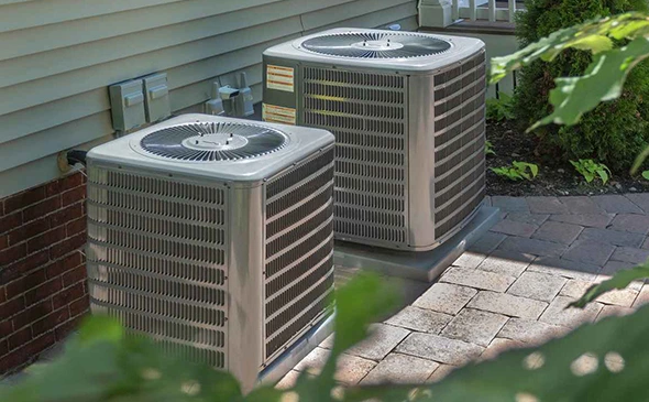 Multiple central air conditioning units installed in Lubbock, TX.